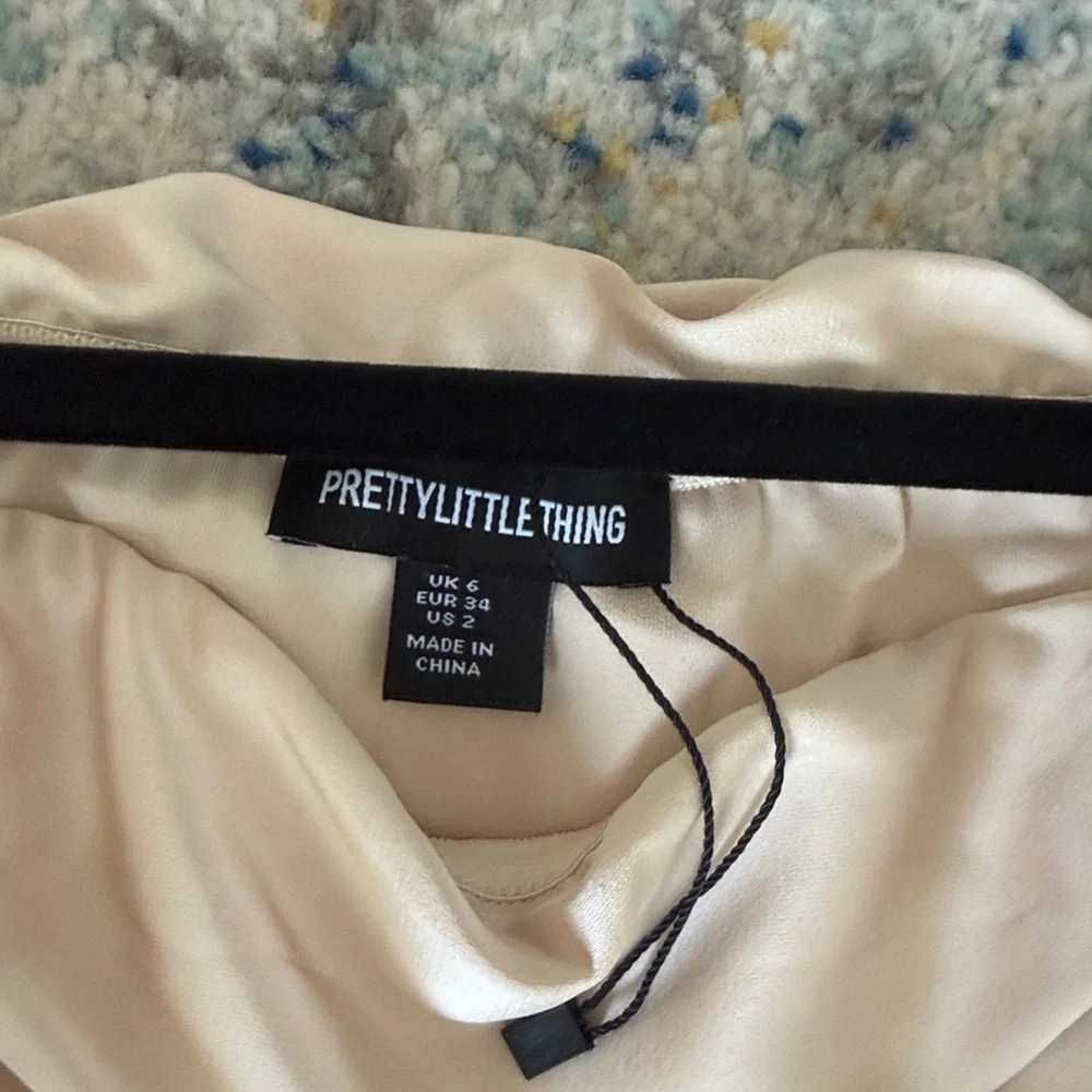 PrettyLittleThing Off-Shoulder Cream Mini Dress - Picture 9 of 10